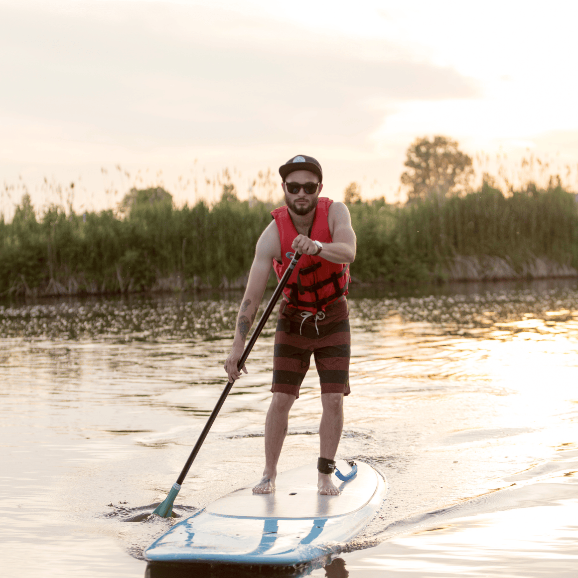 man paddleboarding