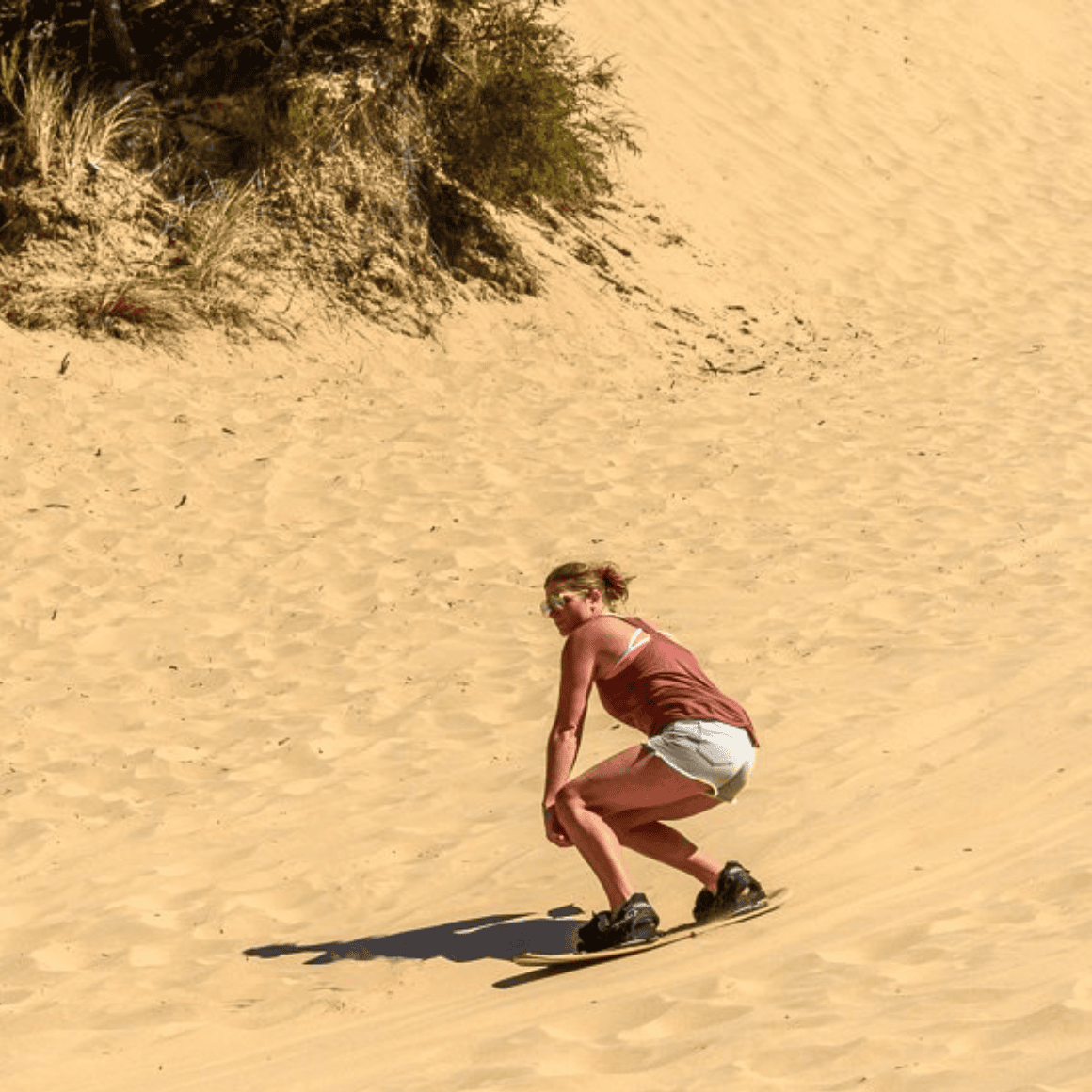 sandboarding at the beach