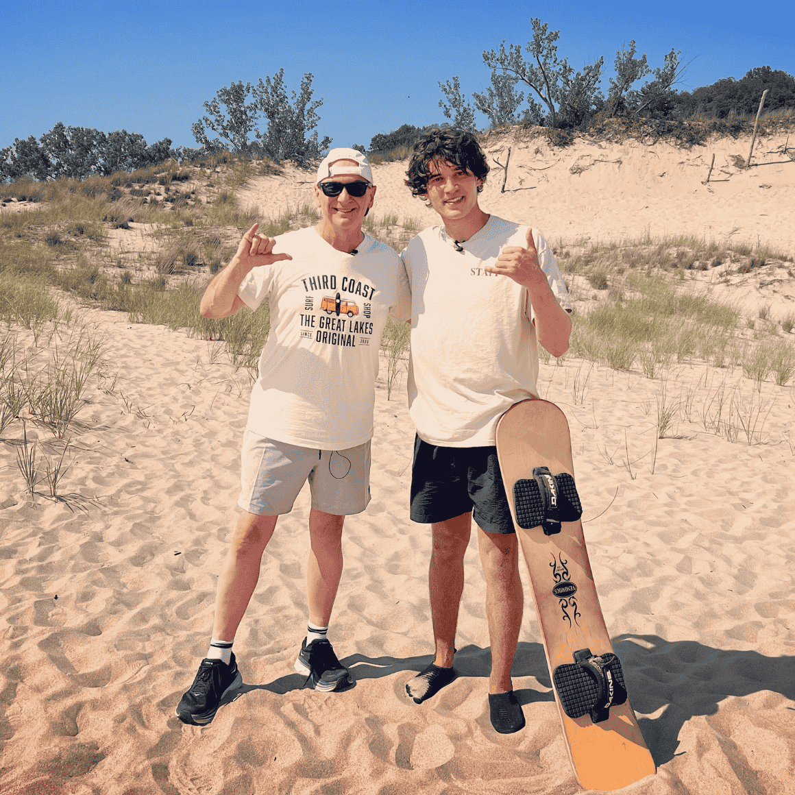two people sandboarding near south bend