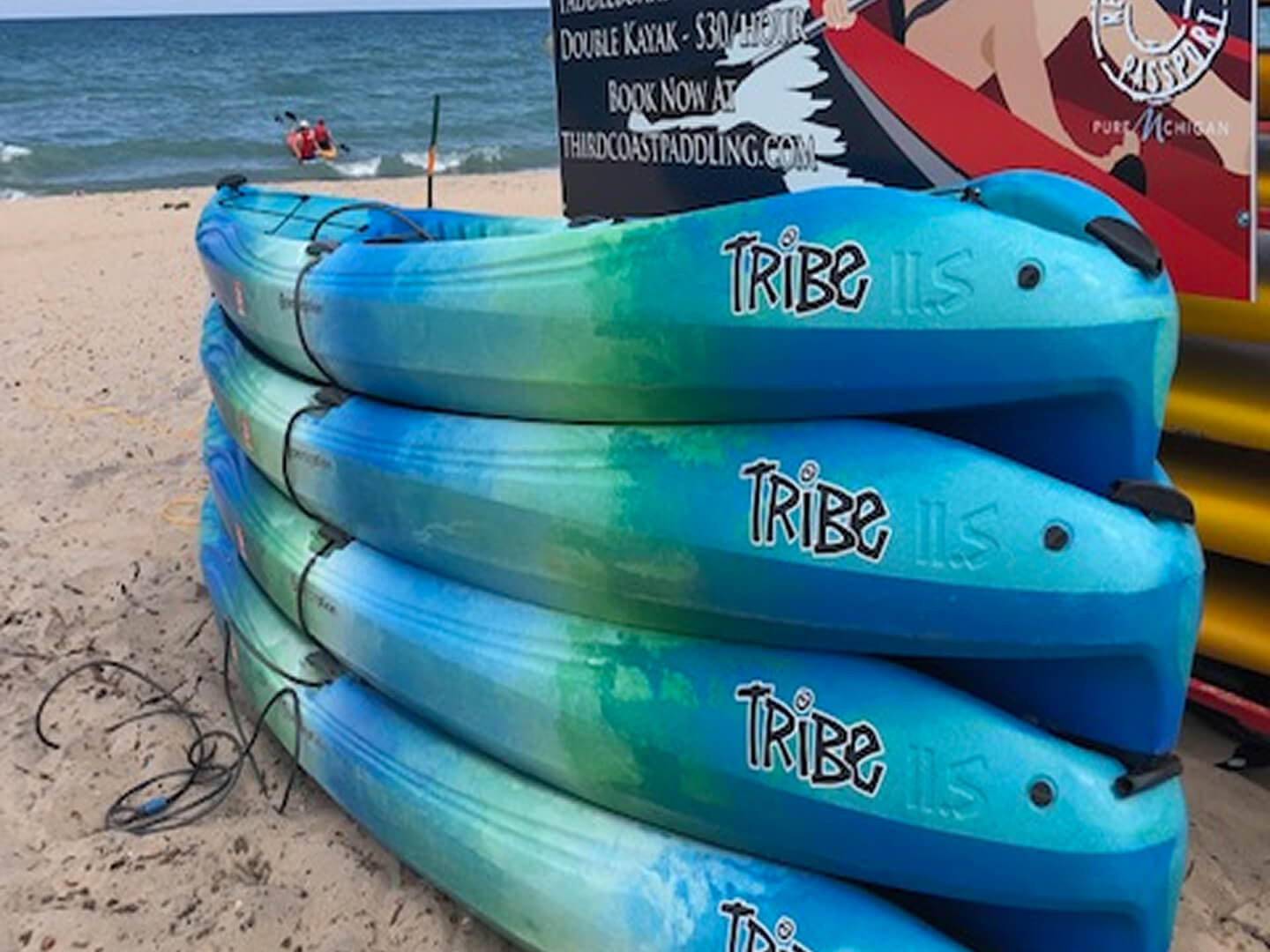 stack of kayak rentals at warren dunes state park