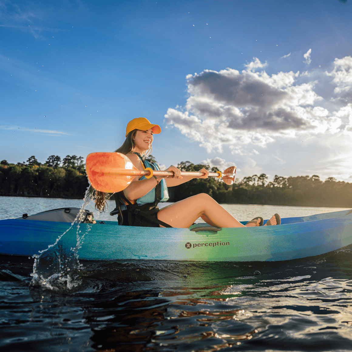 person kayaking in the water