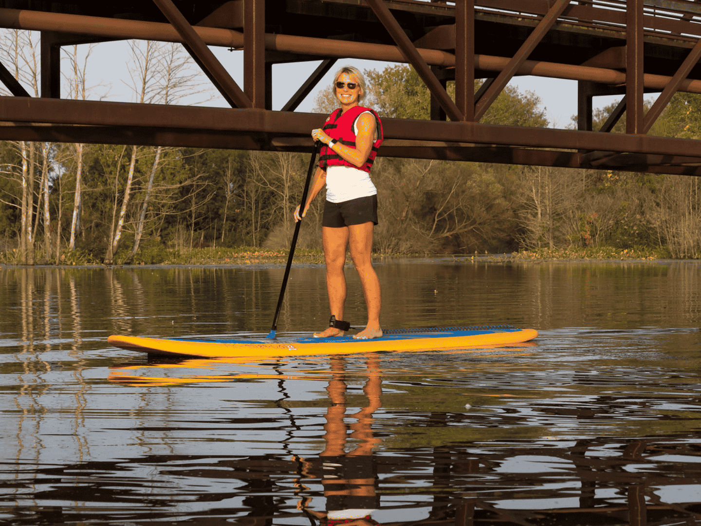 woman paddleboarding